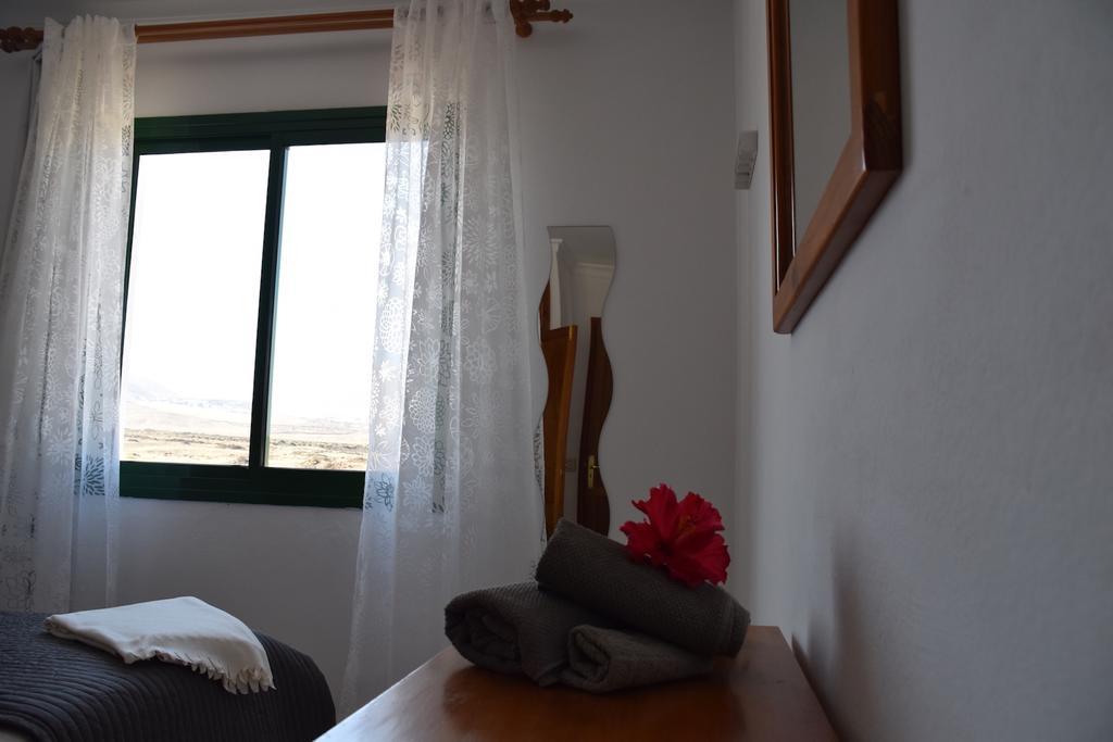 Alhambra Apartamentos Tias Bagian luar foto