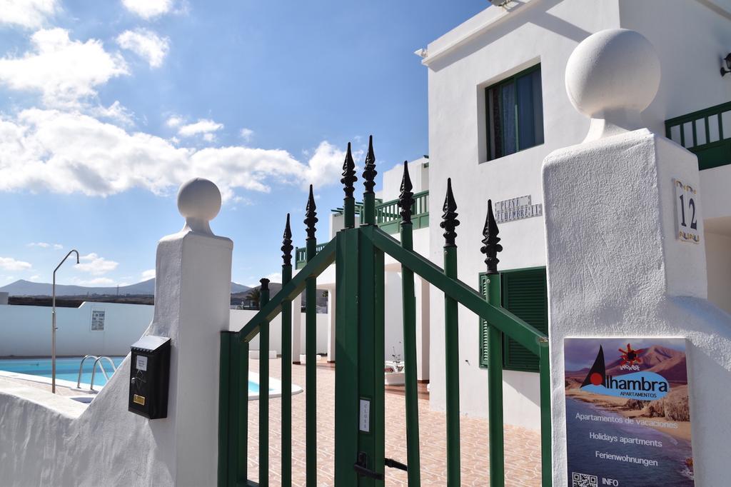 Alhambra Apartamentos Tias Bagian luar foto